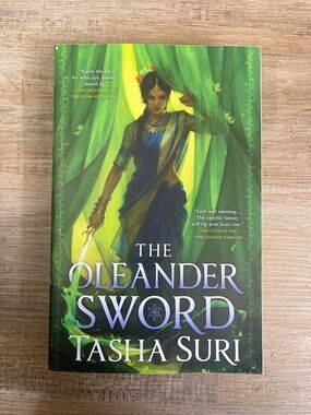 The Oleander Sword by Tasha Suri - Green & Purple Fantasy Paperback